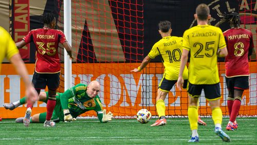 Brad Guzan is unable to stop a goal in the first half of the Atlanta United game against Columbus Crew at Mercedes Benz Stadium in Atlanta, GA on July 20, 2024. (Jamie Spaar for the Atlanta Journal Constitution)