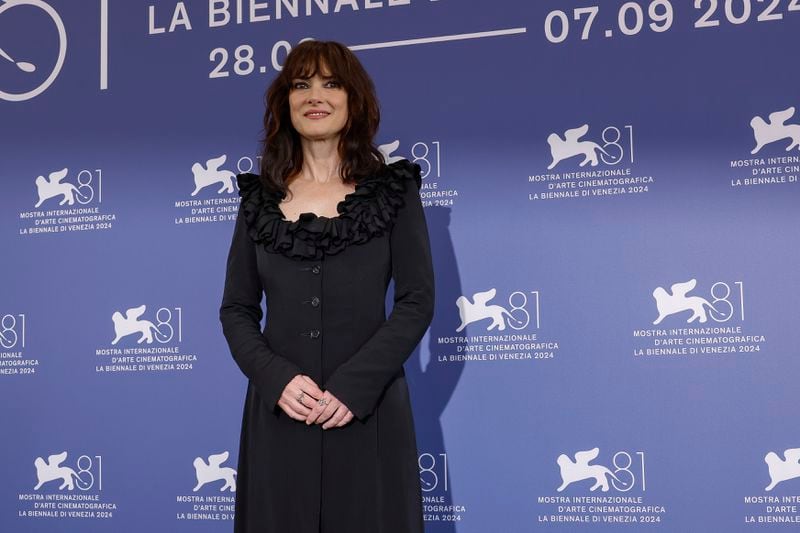 Winona Ryder poses for photographers at the photo call for the film 'Beetlejuice Beetlejuice' during the 81st edition of the Venice Film Festival in Venice, Italy, on Wednesday, Aug. 28, 2024. (Photo by Joel C Ryan/Invision/AP)