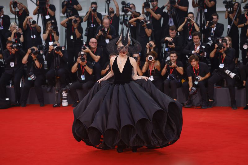 Lady Gaga poses for photographers upon arrival for the premiere of the film 'Joker: Folie A Deux' during the 81st edition of the Venice Film Festival in Venice, Italy, on Wednesday, Sept. 4, 2024. (Photo by Vianney Le Caer/Invision/AP)