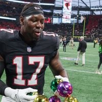 Atlanta Falcons linebacker Arnold Ebiketie (17) celebrates after winning a NFL football game between the Atlanta Falcons and the New Orleans Saints 24-15 in Atlanta on Sunday, Nov. 26, 2023.   (Bob Andres for the Atlanta Journal Constitution)