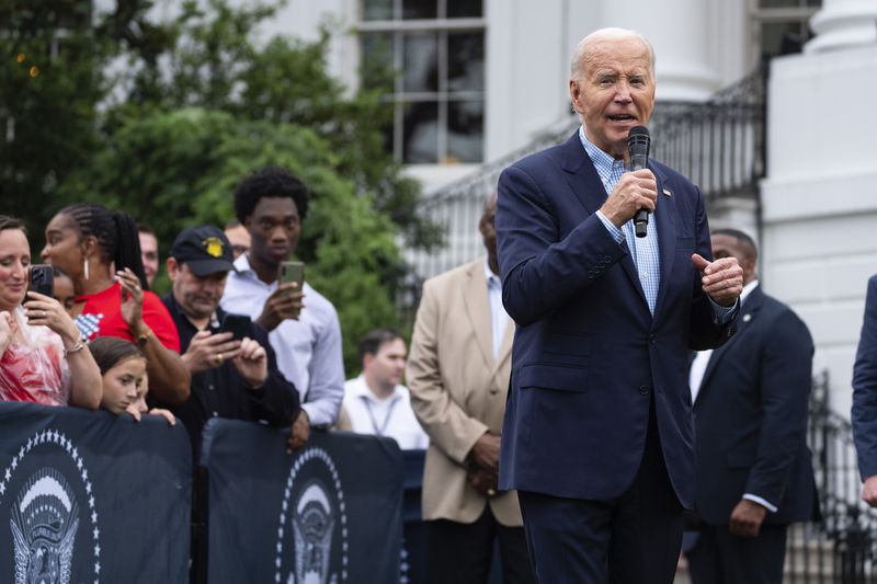 President Joe Biden speaks during a barbecue with active-duty military service members and their families on the South Lawn of the White House, Thursday, July 4, 2024, in Washington. (AP Photo/Evan Vucci)