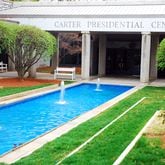 A reflective pool  in front of the Jimmy Carter Presidential Library and Museum in Atlanta. A number of events are planned to mark the former president's 100th birthday later this year. Some of the events are scheduled in Carter's hometown of Plains and in Atlanta, including at the presidential library. (James Kirkikis/Dreamstime/TNS)