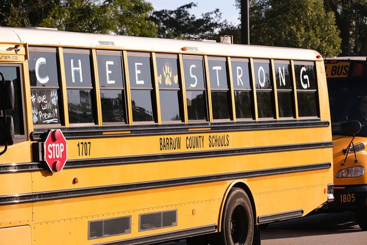 The team bus from Apalachee is parked outside the stadium with a message. Apalachee High School returned to the field against Athens Clark Central Saturday September 28, 2024 in their first game since the school schooting earlier in the month.

 Nell Carroll for the Journal Constitution