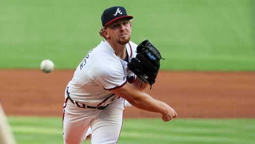 Atlanta Braves starting pitcher Spencer Schwellenbach (56) delivers to a Washington Nationals batter. (Jason Getz / AJC)