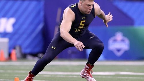 Utah tackle Garett Bolles working out at the combine. Utah. (Associated Press)