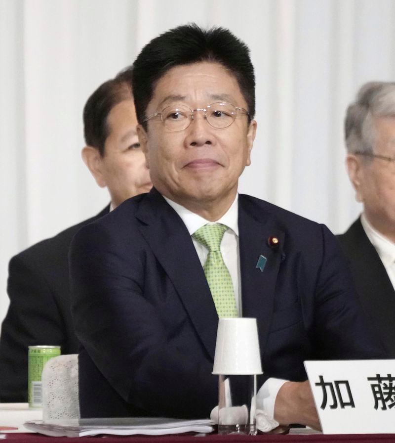 Former Chief Cabinet Secretary Katsunobu Kato, a candidate for the ruling Liberal Democratic Party's presidential election, attends a joint speech session with other candidates, at the party's headquarters in Tokyo, Japan Thursday, Sept. 12, 2024.(Kyodo News via AP)