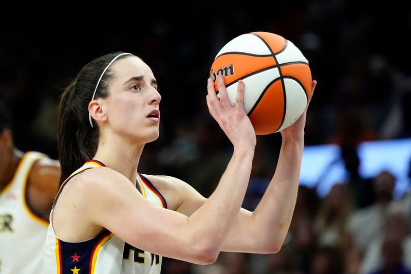 Indiana Fever guard Caitlin Clark prepares a technical foul shot against the Phoenix Mercury during the first half of a WNBA basketball game Sunday, June 30, 2024, in Phoenix. (AP Photo/Ross D. Franklin)