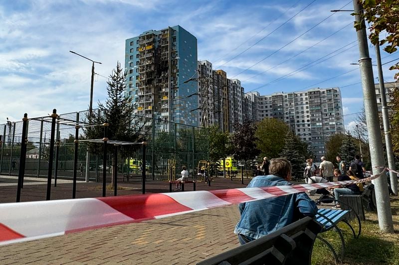 A view of the site of the damaged multi-storey residential building, following an alleged Ukrainian drone attack in Ramenskoye, outside Moscow, Moscow region, Russia, Tuesday, Sept. 10, 2024. (AP Photo)