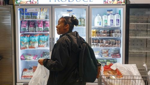 Grocery prices are 3.9% above a year ago. That's far smaller increase than during 2021 and 2022, but food prices are still dramatically higher than pre-pandemic. Here, Alice Sanders shops at the client choice food pantry at St. Vincent de Paul Society in Chamblee on Wednesday, Feb. 28, 2024. The food pantry provides free food to people in need in. (Natrice Miller/ Natrice.miller@ajc.com)