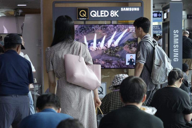 A TV screen shows a file image of North Korea's missiles launch during a news program at Seoul Railway Station in Seoul, South Korea, Wednesday, Sept. 18, 2024. (AP Photo/Ahn Young-joon)