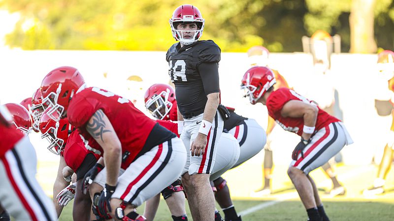 Georgia quarterback JT Daniels (18) looks for a play call during the Bulldogs’ practice session Monday, Nov. 2, 2020, in Athens. (Tony Walsh/UGA Sports)