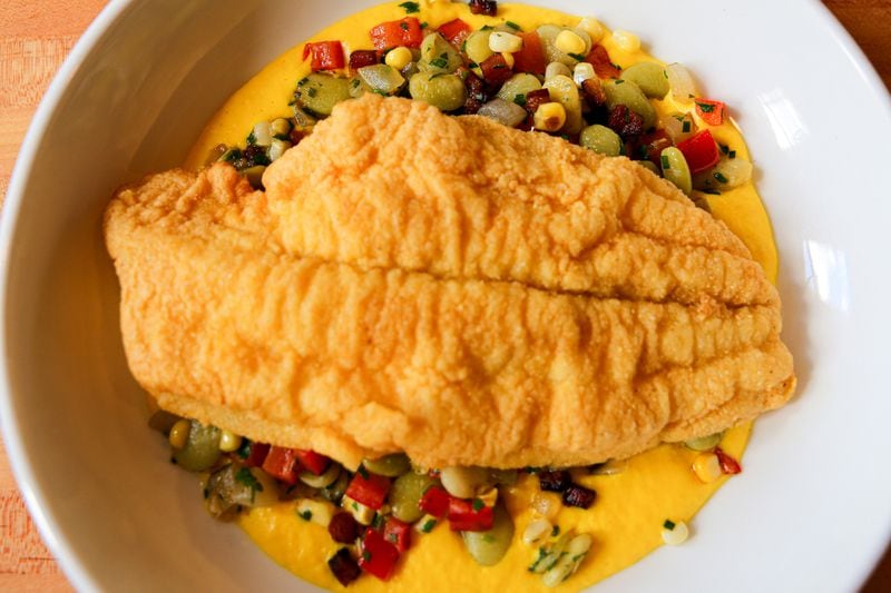 You can get catfish with butterbean succotash at Cotton & Rye. (Adriana Iris Boatwright for The Atlanta Journal-Constitution) 