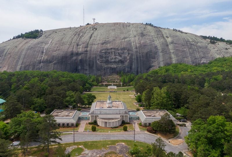 An aerial photograph shows Memorial Hall (foreground) and Confederate Memorial Carving (background) at Stone Mountain Park on Tuesday, April 20, 2021. (Hyosub Shin/Atlanta Journal-Constitution/TNS)