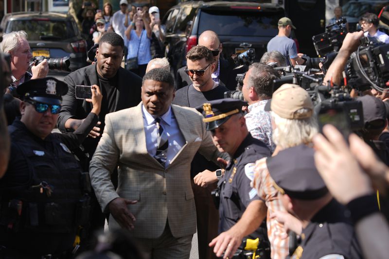 Justin Timberlake, center, walks into court for his arraignment, Friday, Sept. 13, 2024, in Sag Harbor, N.Y. (AP Photo/Pamela Smith)