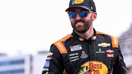 FILE - Driver Austin Dillon smiles prior to a NASCAR Cup Series auto race at Charlotte Motor Speedway, Sunday, May 26, 2024, in Concord, N.C. (AP Photo/Matt Kelley, File)