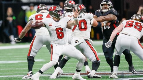 Tampa Bay Buccaneers quarterback Baker Mayfield (6) prepares a pass during the second half of an NFL football game against the Atlanta Falcons on Sunday, Dec. 10, 2023, at Mercedes-Benz Stadium in Atlanta. 
Miguel Martinez/miguel.martinezjimenez@ajc.com