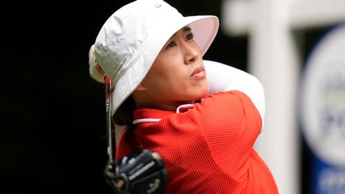 Amy Yang, of South Korea, watches her shot after hitting from the 16th tee during the final round of the Women's PGA Championship golf tournament at Sahalee Country Club, Sunday, June 23, 2024, in Sammamish, Wash. (AP Photo/Gerald Herbert)