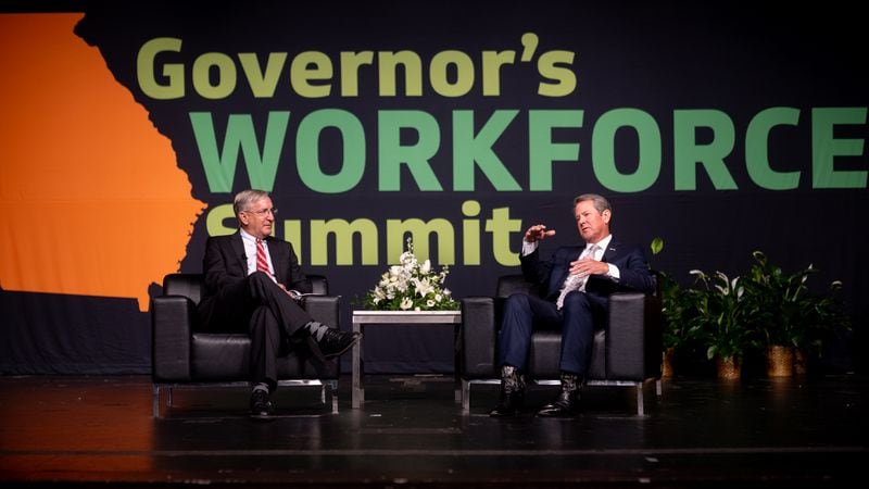 President of Kia Georgia Stuart Countess and  Governor Brian Kemp speak on stage. Georgia Governor Brian Kemp gives the key note address at the Governor's Workforce Summit held at the Georgia World Congress Center. Friday, Sept. 13, 2024 (Ben Hendren for the Atlanta Journal-Constitution)