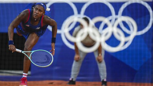 Coco Gauff of United States returns the ball against Ajla Tomljanovic of Australia during the women's singles tennis competition, at the 2024 Summer Olympics, Sunday, July 28, 2024, in Paris, France. (AP Photo/Manu Fernandez)