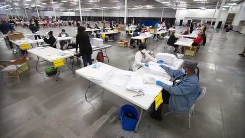Dekalb election workers sort presidential ballots in Stonecrest Saturday, November 14, 2020. Steve Schaefer for The Atlanta Journal-Constiution