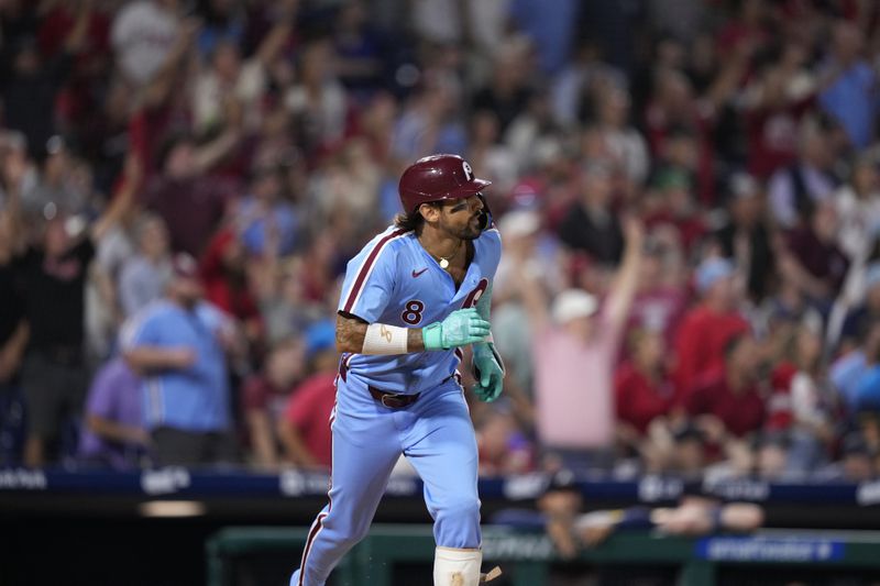 Philadelphia Phillies' Nick Castellanos watches after hitting a two-run home run against Atlanta Braves pitcher Grant Holmes during the seventh inning of a baseball game, Thursday, Aug. 29, 2024, in Philadelphia. (AP Photo/Matt Slocum)