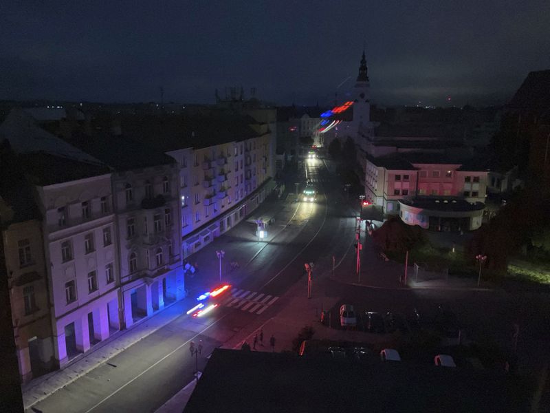 A view of a street as the electricity went out due to recent floods in Opava, Czech Republic, Sunday, Sept. 15, 2024. (AP Photo/Jan Gebert)