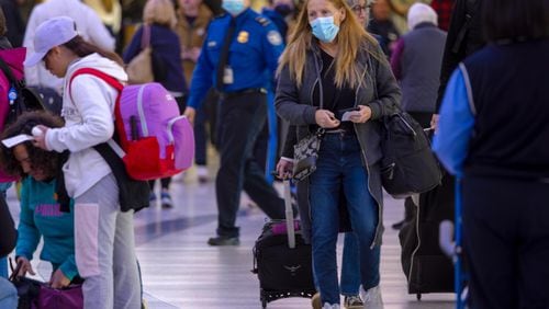 Passengers, with and without face mask, at Los Angeles International Airport on Wednesday, Jan. 10, 2024, in Los Angeles, California. (Irfan Khan/Los Angeles Times/TNS)