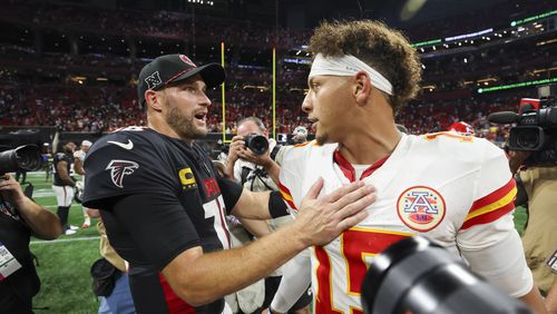 Atlanta Falcons quarterback Kirk Cousins (left) greets Kansas City Chiefs quarterback Patrick Mahomes after their game at Mercedes-Benz Stadium, Sunday, Sept. 22, 2024, in Atlanta. The Falcons lost 22-17. (Jason Getz / AJC)