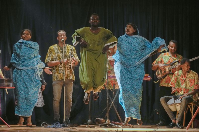 Sudanese Camirata troupe perform at the Italian culture center in Cairo, Egypt, Wednesday, July 24, 2024. (AP Photo/Amr Nabil)