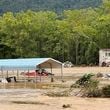 This photo provided by Kelly Benware shows flooding around the football field at Asheville Christian Academy in Swannanoa, N.C., on Friday, Sept. 27, 2024. (Kelly Benware via AP)