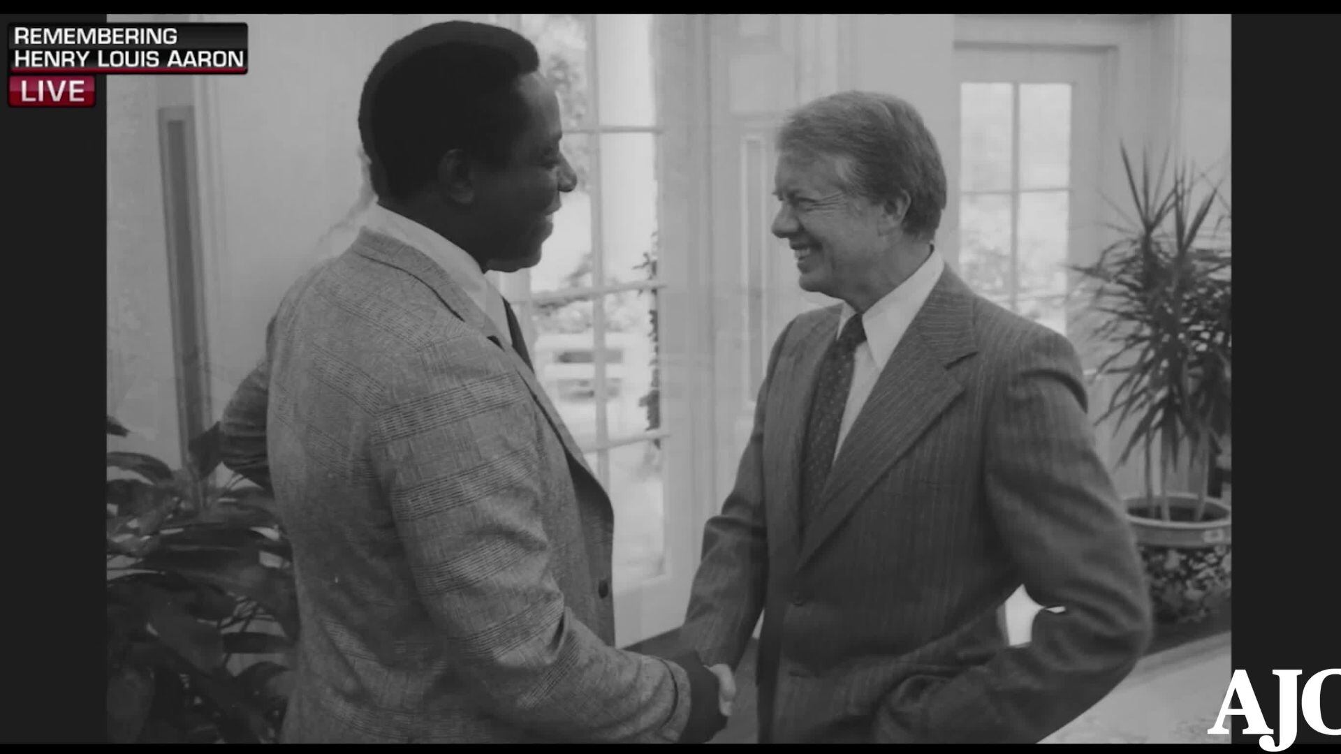 Brian Snitker greets Hank Aaron s wife Billye Aaron at a ceremony