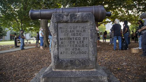 10/11/2021 — Decatur, Georgia —A  cannon monument, installed by the United Daughters of the Confederacy in 1906, is displayed near the Old DeKalb County courthouse  in downtown Decatur, Monday, October 11, 2021. (Alyssa Pointer/ Alyssa.Pointer@ajc.com)