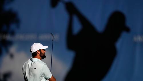 Scottie Scheffler hits on the driving range prior to the third round of the BMW Championship golf event at Castle Pines Golf Club, Saturday, Aug. 24, 2024, in Castle Rock, Colo. (AP Photo/Matt York)