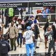 Travelers streamed into Hartsfield-Jackson International Airport on Friday, Aug. 30, 2024, which was expected to be the busiest day of the Labor Day travel period. (John Spink/AJC)