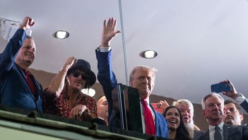 Republican presidential nominee former President Donald Trump waves to the crowd during the Georgia vs. Alabama football game at Bryant-Denny Stadium, Saturday, Sept. 28, 2024, in Tuscaloosa, Ala. (AP Photo/Evan Vucci)