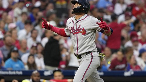 Atlanta Braves' Orlando Arcia reacts after hitting a home run against Philadelphia Phillies pitcher Ranger Suárez during the third inning of a baseball game, Friday, Aug. 30, 2024, in Philadelphia. The Braves won 7-2. (AP Photo/Matt Slocum)