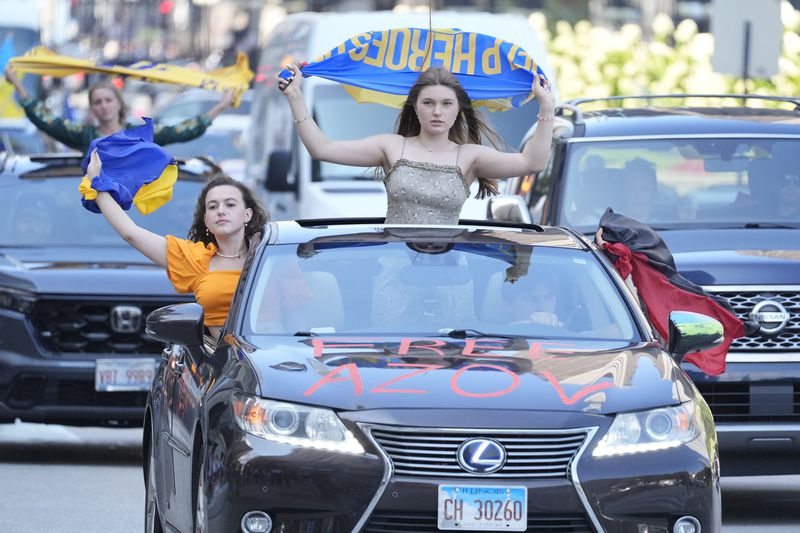 Ukrainian supporters protest downtown prior to the start of the Democratic National Convention Sunday, Aug. 18, 2024, in Chicago. (AP Photo/Frank Franklin II)