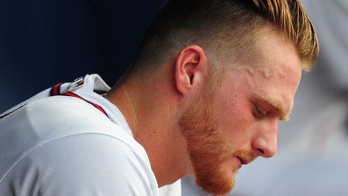 Shelby Miller of the Braves sits in the dugout after allowing a four-run first inning against Washington Tuesday night. (Scott Cunningham/Getty Images)