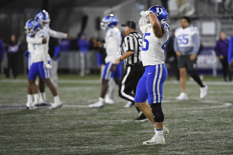 Duke linebacker Ozzie Nicholas (45) celebrates after beating Northwestern at the end of the second overtime period of an NCAA college football game, Friday, Sept. 6, 2024, in Evanston, Ill. (AP Photo/Matt Marton)