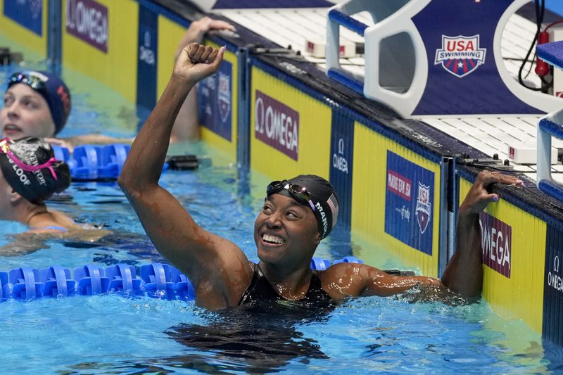 Simone Manuel reacts after winning the Women's 50 freestyle finals Sunday, June 23, 2024, at the US Swimming Olympic Trials in Indianapolis. (AP Photo/Darron Cummings)