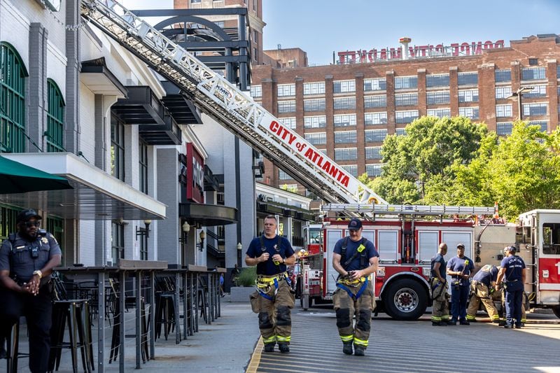 Dozens of people were evacuated from a Midtown Whole Foods grocery store after a small fire broke out in a pizza oven.(John Spink/AJC)