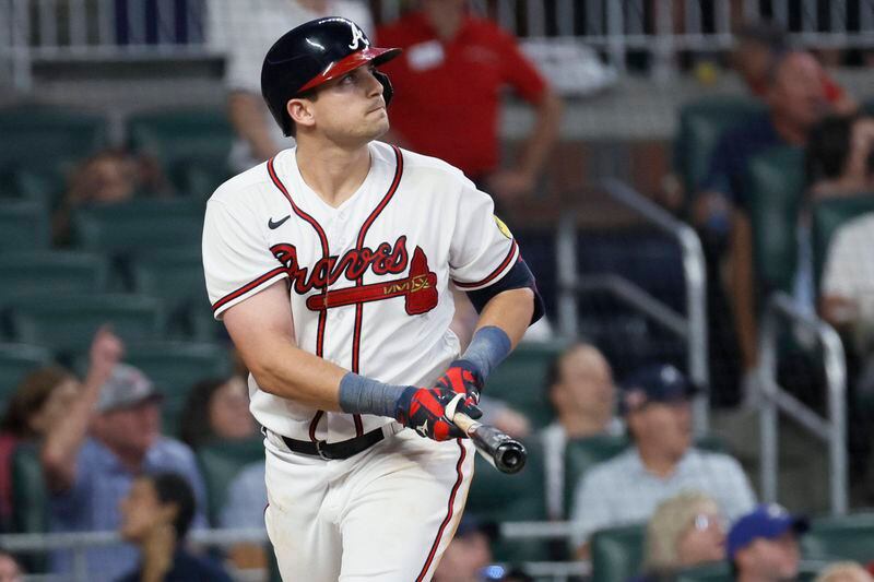  Braves third baseman Austin Riley (27) watches the ball after hitting a two-run home run during the sixth inning against the Diamondbacks at Truist Park Tuesday, July 18, 2023, in Atlanta. Miguel Martinez / miguel.martinezjimenez@ajc.com 