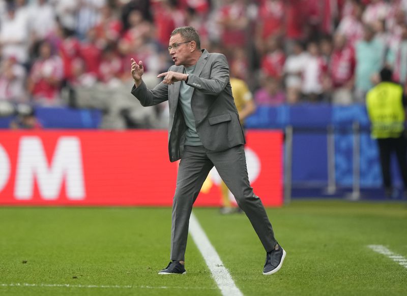 Austria's head coach Ralf Rangnick instructs his players during a Group D match between Poland and Austria at the Euro 2024 soccer tournament in Berlin, Germany, Friday, June 21, 2024. (AP Photo/Ebrahim Noroozi)