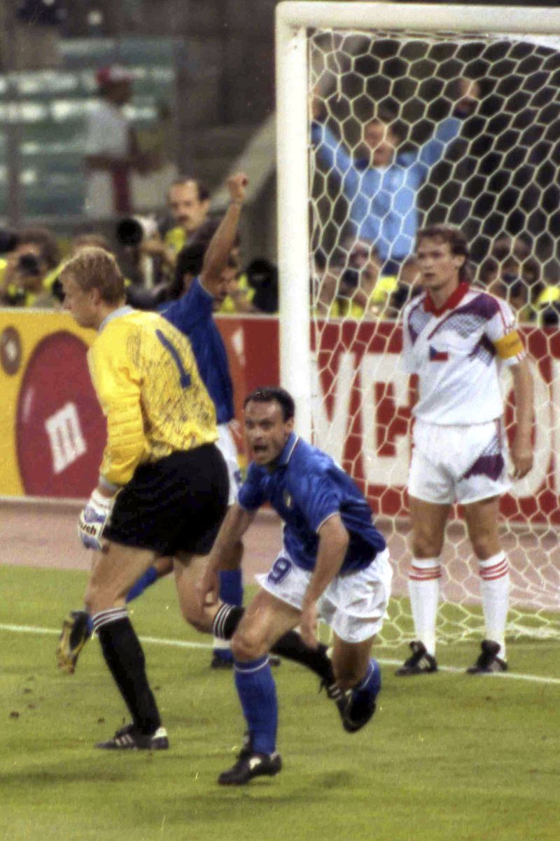 FILE - Italian forward Salvatore "Totò" Schillaci, center, celebrates after scoring the first goal for Italy in the World Cup game against Czechoslovakia, in Rome, Italy, June 19, 1990. (AP Photo/Martin Cleaver, file)