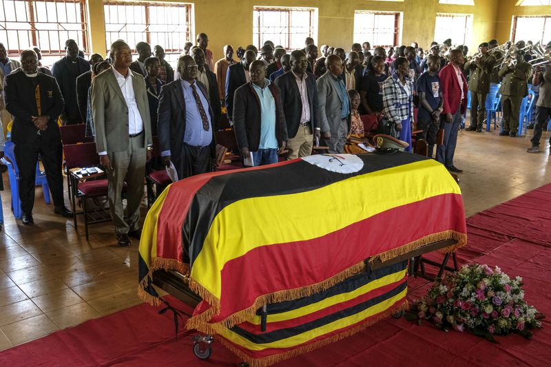 Members of the public gather for a funeral service of Ugandan Olympic athlete Rebecca Cheptegei ahead of her burial in Kapkoros, Bukwo District, Uganda Saturday, Sept. 14. 2024. (AP Photo/Hajarah Nalwadda)