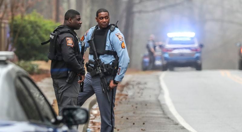 Georgia state troopers helping conduct a "clearing operation" at the site of Atlanta's planned public safety training center on Jan. 18, 2023, exchanged gunfire with a protester, leaving the protester dead and one trooper wounded. (John Spink / John.Spink@ajc.com)

