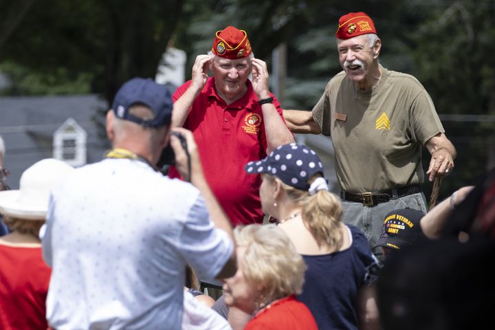 Retired Marines Steve Reilly, left, and Doug Tasse pose for a photo before the Memorial Day ceremony at Marietta National Cemetery on Monday, May 27, 2024. (Ben Gray / Ben@BenGray.com)