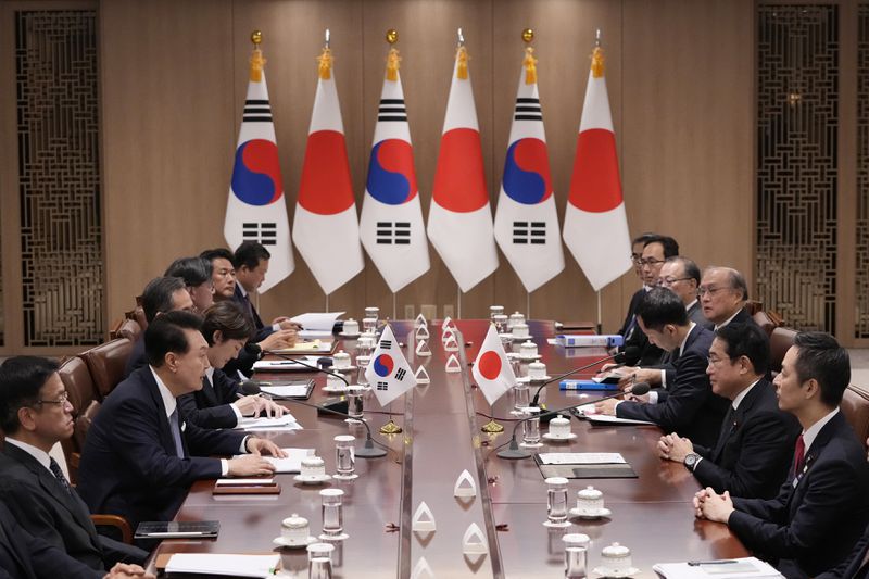 South Korean President Yoon Suk Yeol, second left, and Japanese Prime Minister Fumio Kishida, second right, attend a meeting at the Presidential Office in Seoul, South Korea, Friday, Sept. 6, 2024. (AP Photo/Lee Jin-man, Pool)