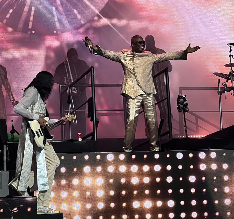 Philip Bailey, lead singer for Earth, Wind & Fire, with Verdine White (left) at the start of their set at Ameris Bank Amphitheatre at Alpharetta. ROB STEARNS/SPECIAL