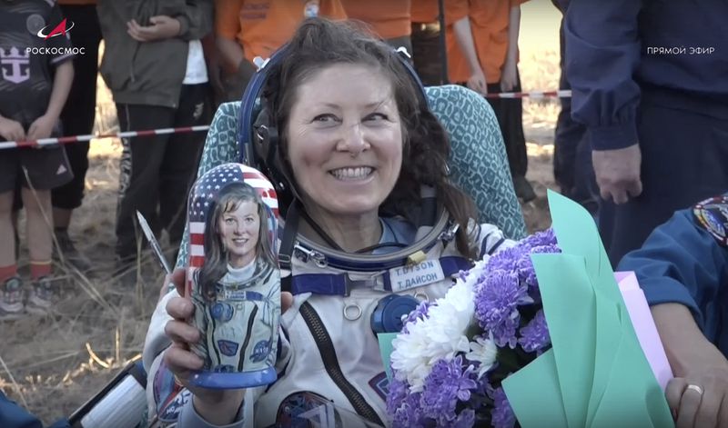 In this photo taken from video released by Roscosmos space corporation, the NASA astronaut Tracy Dyson holds a Russian traditional Matryoshka wooden doll depicting her shortly after the landing of the Russian Soyuz MS-25 space capsule carrying the NASA astronaut Tracy Dyson and the Roscosmos cosmonauts Oleg Kononenko and Nikolai Chub, south-east of the Kazakh town of Zhezkazgan, Kazakhstan, Monday, Sept. 23, 2024. (Roscosmos space corporation via AP)